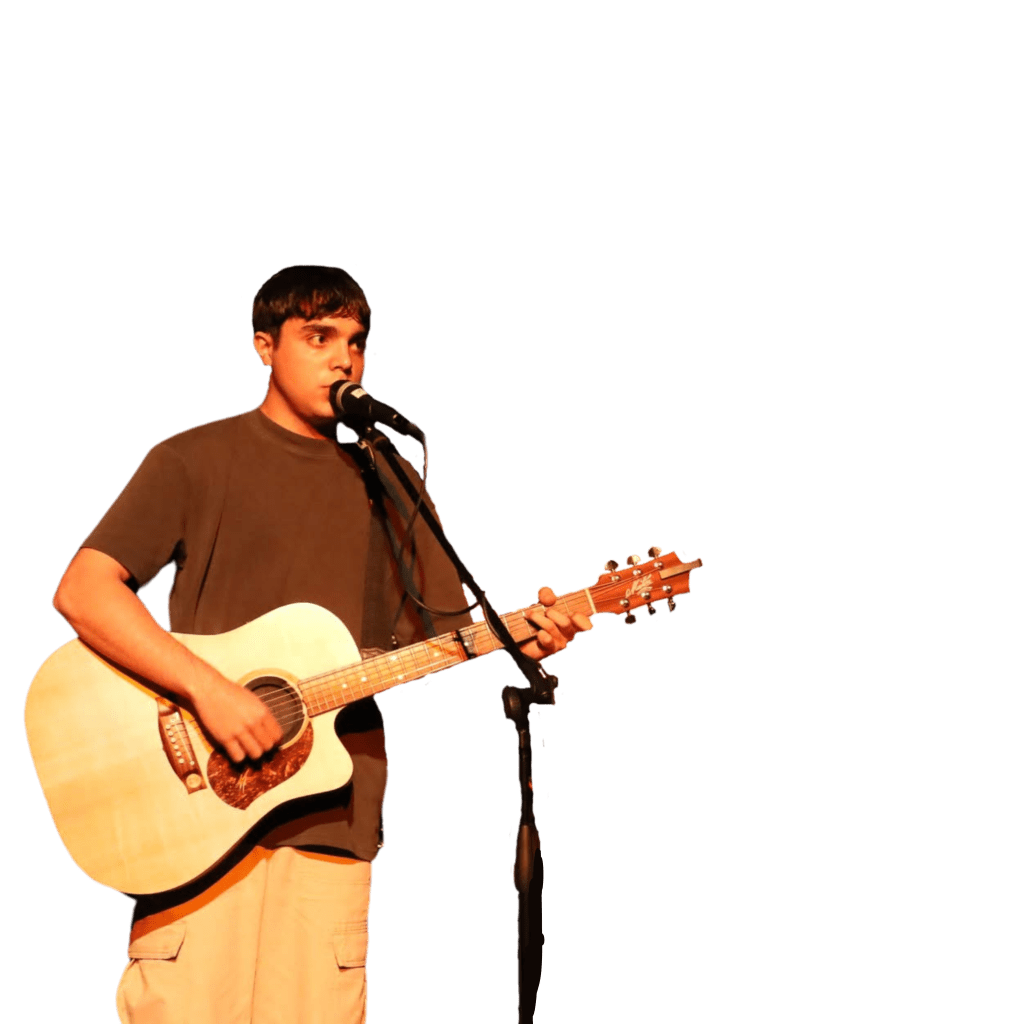 Harry Evans live on Stage. St Edwards Christian Brother's College East Gosford NSW Central Coast. Performing with Guitar and Microphone.