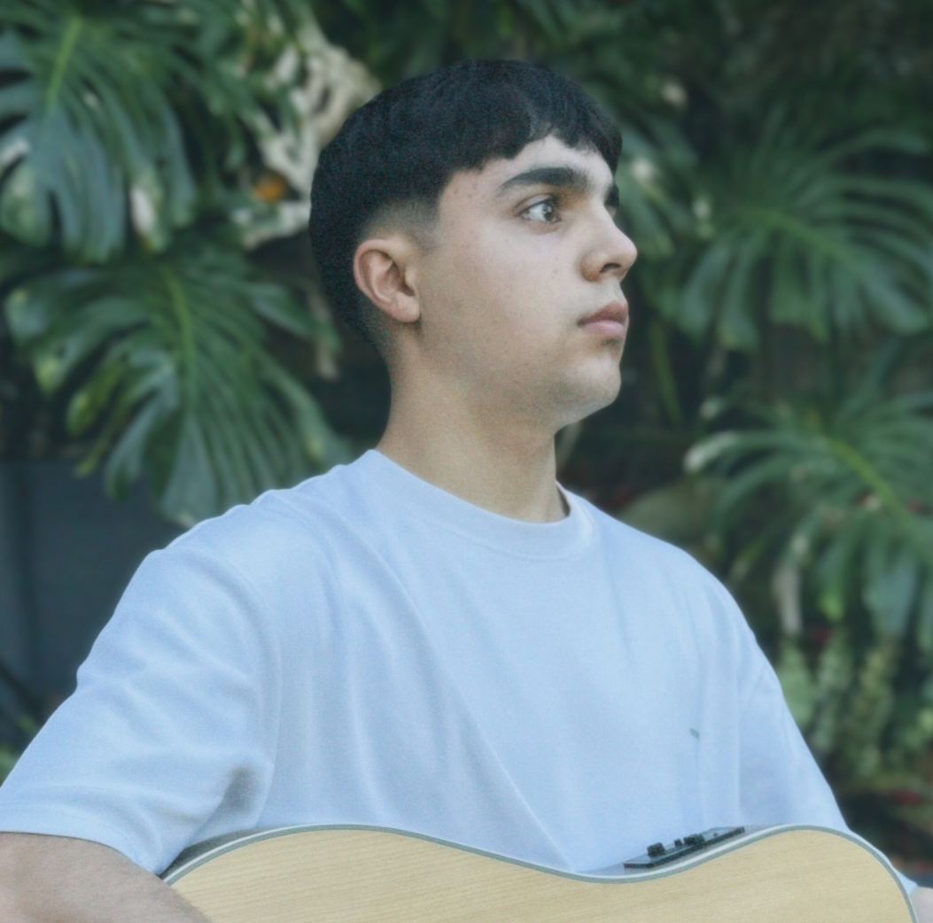 Harry Evans seen with a guitar on the Central Coast.